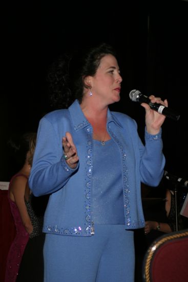 Mary Helen Griffis Singing at Convention Carnation Banquet Photograph 3, July 11, 2004 (image)