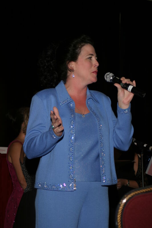 Mary Helen Griffis Singing at Convention Carnation Banquet Photograph 3, July 11, 2004 (Image)