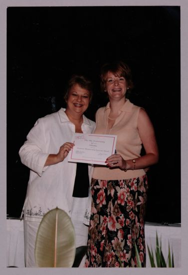 Kathy Williams and Omaha Alumnae Chapter Member With Certificate at Convention Photograph, July 8-11, 2004 (image)