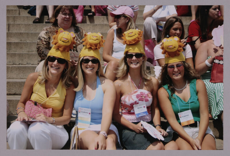 Unidentified, Lindsey, Katie, and Lauren Wearing Lion Hats at Convention Photograph 1, July 10, 2004 (Image)