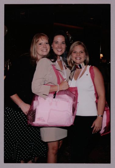 Three Phi Mus With Pink Bags at Convention Photograph, July 8-11, 2004 (image)