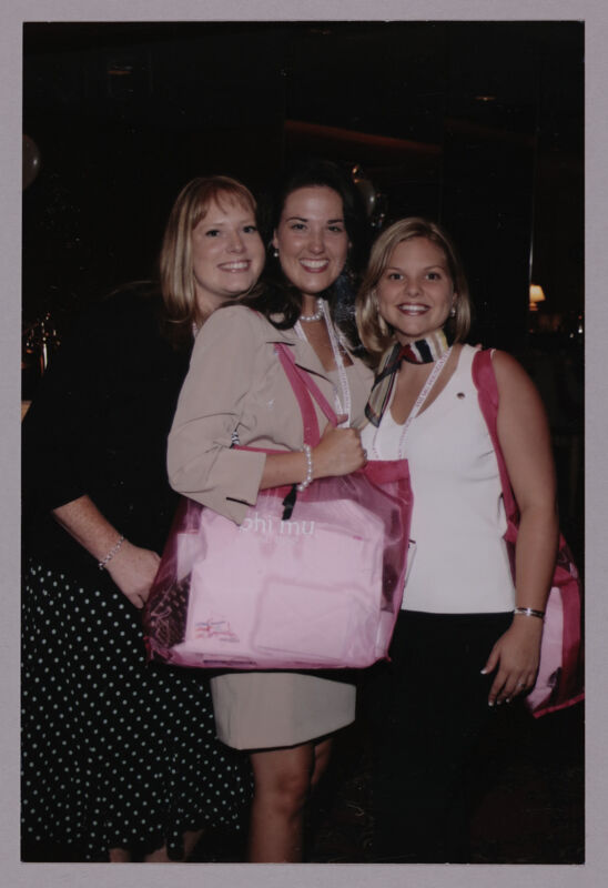 July 8-11 Three Phi Mus With Pink Bags at Convention Photograph Image