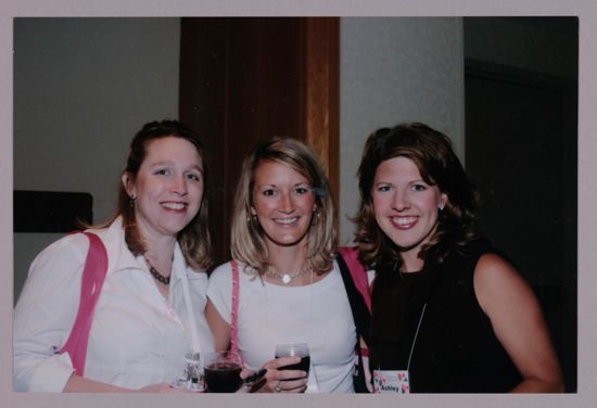 Three Phi Mus With Drinks at Convention Photograph, July 8-11, 2004 (image)