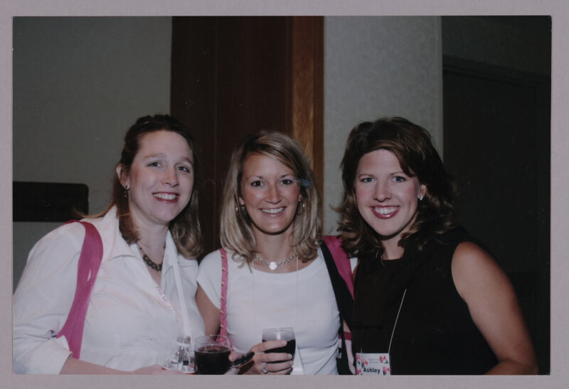 Three Phi Mus With Drinks at Convention Photograph, July 8-11, 2004 (Image)