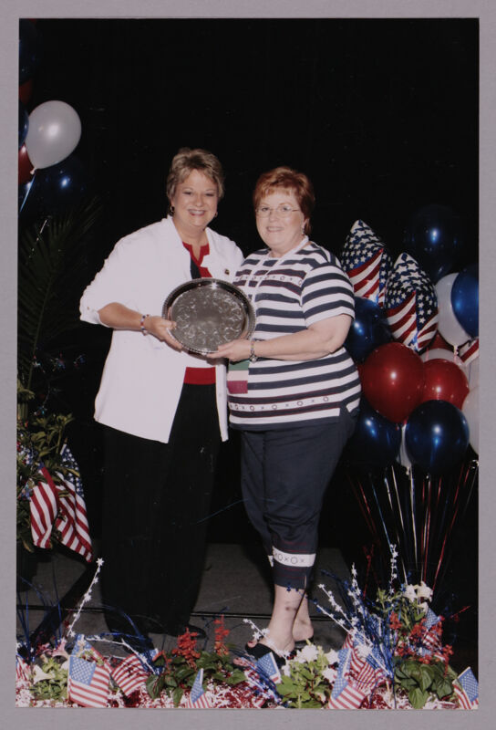 July 8 Kathy Williams and Unidentified With Award at Convention Photograph 2 Image