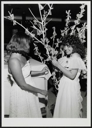 Two Epsilon Zeta Chapter Members With Money Tree Photograph