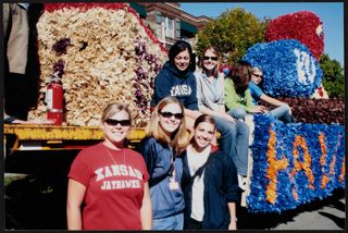 Xi Chapter Members on Homecoming Float Photograph, 2004