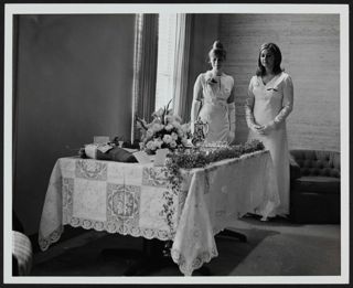 Gigi Graham and Rita Williamson at the Epsilon Sigma Chapter Gift Table Photograph, November 15, 1970