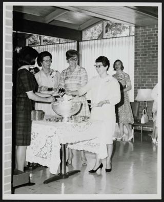 Miller, Collett, Robinson, and Ehrhardt by Punch Bowl at Epsilon Eta Chapter Installation Photograph, May 22, 1965