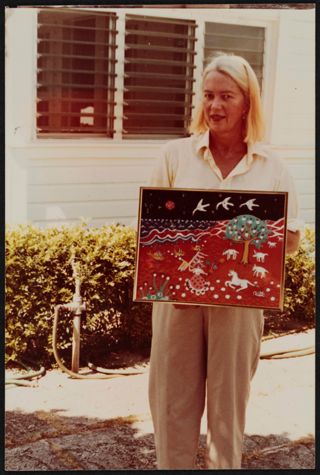 Rosemary Otto Holding Painting Photograph, 1980s