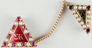 Ann Pope Crown Pearl and Ruby/Garnet Badge with Pearl and Ruby Guard, Fall 1954