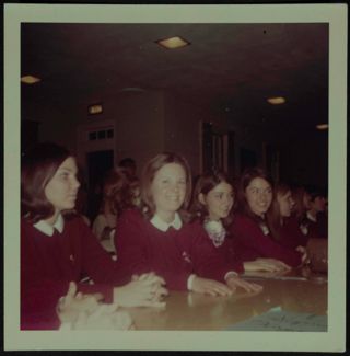 Margaret Toth and Other Beta Theta Chapter Members at Dining Table Photograph, November 1968