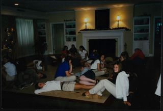 Group of Beta Tau Chapter Members in Living Room Photograph, c. 2001-2003