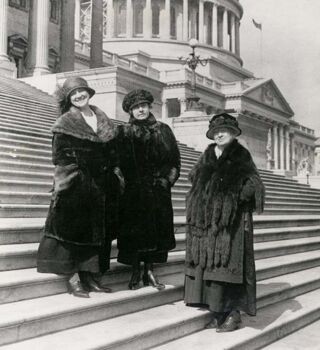Alice Robertson (lower step) in front of the U.S. Capitol with two women elected in 1922