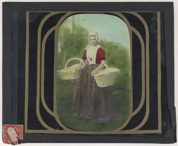 [Young woman carrying two baskets]