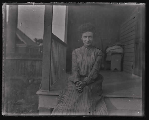 Lady Sitting on Porch