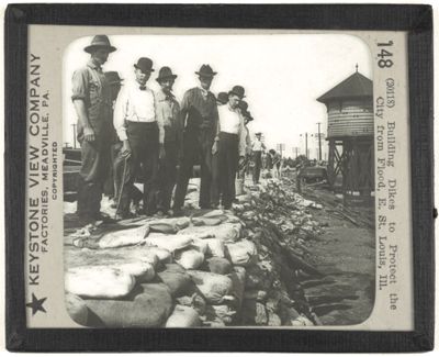 Building Dikes to Protect the City from Flood, E. St. Louis, Ill.