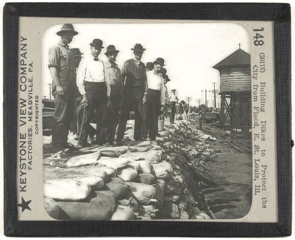 Building Dikes to Protect the City from Flood, E. St. Louis, Ill.