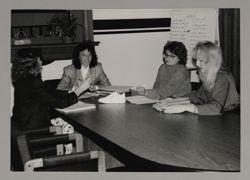 Second Century Campaign Committee Members Finalizing Shoe Marketing Campaign Photograph, c. 1985