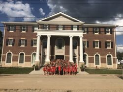 Delta Omega Chapter Members in Front of Chapter House Photograph, September 2018