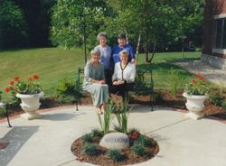 Alpha Chi Omega leaders in the Pathway Garden at Alpha Chi Omega Headquarters, 5939 Castle Creek Parkway N. Drive, Indianapolis