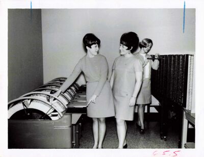 Staff members at Washington Boulevard headquarters, 1960s, photograph