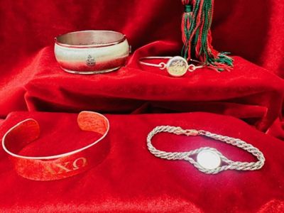 Examples of Alpha Chi Omega silver bracelets, various years