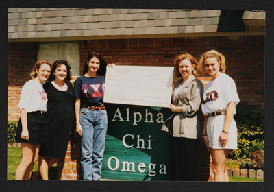 Epsilon Lambda Chapter Members Presenting Check to Arlington Women's Shelter Photograph, March 28, 1998