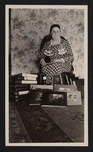 Bertha Cunningham with Books Photograph, December 9, 1934