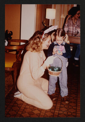 Delta Nu Chapter Member and Child at Easter Seal Service Project Photograph, c. 1981