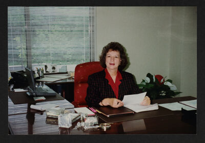 Nancy Leonard at Desk Photograph