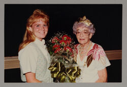 Ruth Winsor Receiving Carnations from Phi Chapter President Photograph, c. 1990