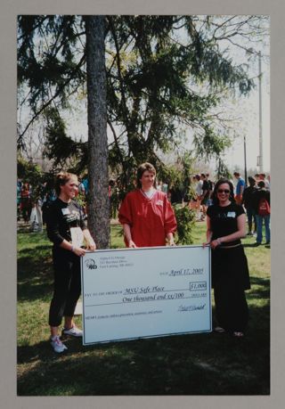 Beta Epsilon Chapter Members Presenting Check to MSU Safe Place Photograph, April 17, 2005