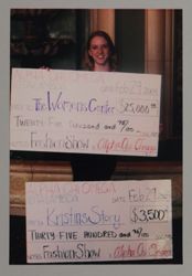 Iota Lambda (Texas Christian University) member with novelty checks, photograph, February 29, 2004
