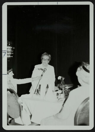 Jean Rose Giving Speech Photograph