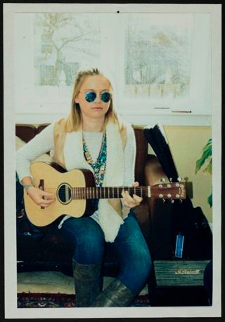 Missouri Alpha Chapter Member With Guitar Photograph