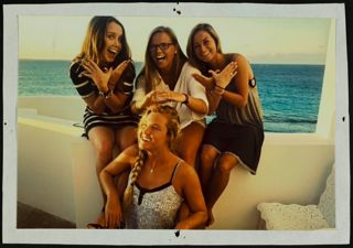 Four Missouri Alpha Chapter Members on a Ship Photograph
