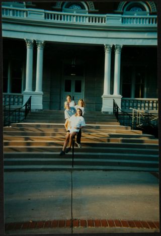 Four Missouri Alpha Chapter Members on Stairs Photograph