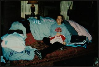 Missouri Alpha Chapter Member on Couch Photograph 2