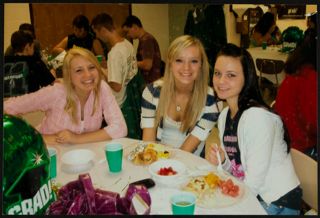 Three Missouri Alpha Chapter Members at Grad Party Photograph