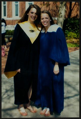 Two Missouri Alpha Chapter Members in Graduation Robes Photograph, April 24, 2009