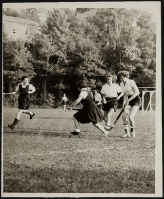 Gamma Pi Chapter Members Playing Field Hockey Photograph