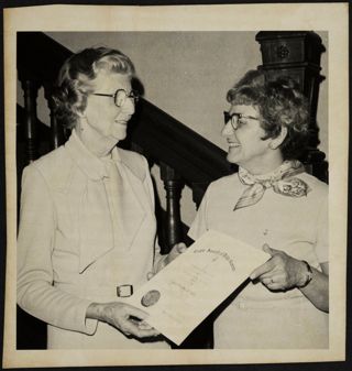 Helen Strickler Receiving Cable Award From Marian Honzik Photograph, 1977