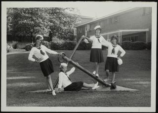 Graham, Cooper, Gordon, and Sargent Standing With an Anchor Photograph