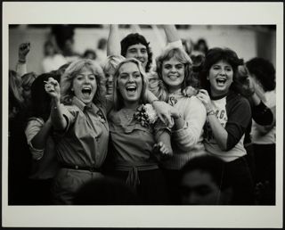 Lyons, Williams, Smith, and Stout Celebrating a Delta Gamma Homecoming Queen Photograph, 1982