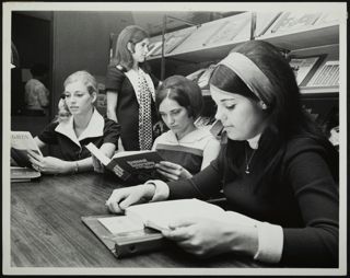 Gamma Sigma Chapter Members Sazma, Hult, Owens, and Peguero Studying Photograph