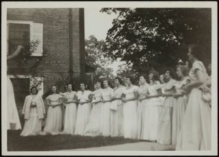 Beta Mu Chapter Members Rehearsing for the May Sing Photograph