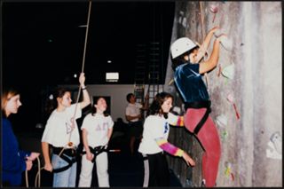 Sarah Conway and Becca Gillis Helping With Rock Climbing Photograph, c. 2000