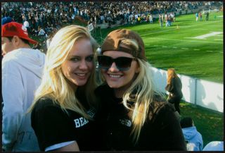 Two Epsilon Lambda Chapter Members at Football Game Photograph
