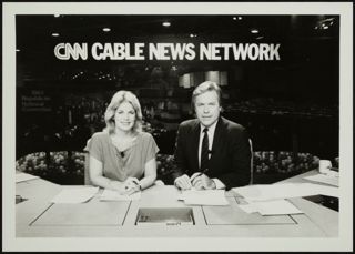 Chris Curle and Don Farmer at CNN Cable News Network Desk Photograph, August 20-23, 1984